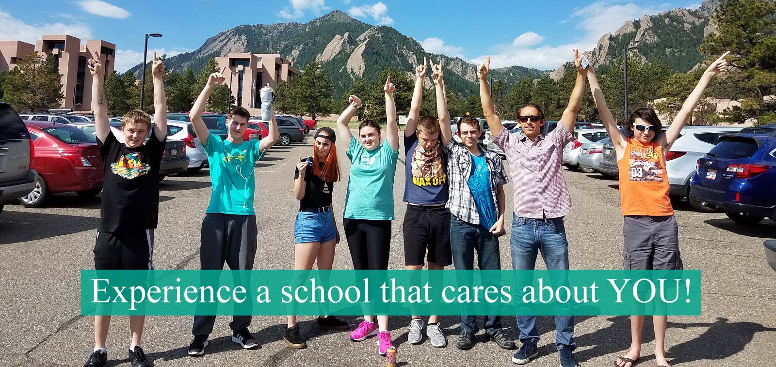 Students on field trip to NCAR putting their hands in the air with text that says: Experience a school that cares about you.