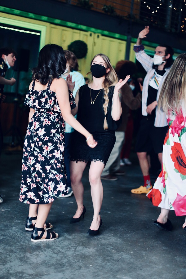 Two teachers dancing at Prom.