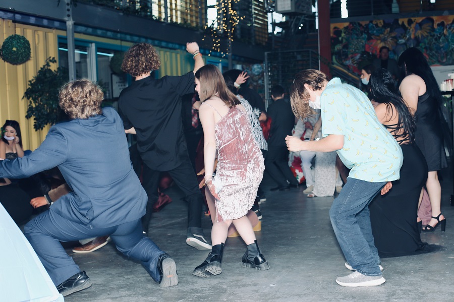 Students getting down during a line dance at Prom.